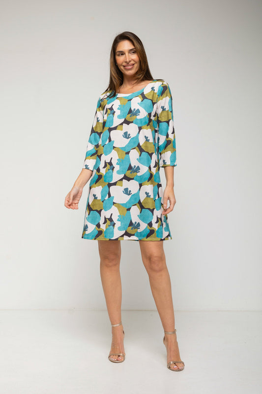 Woman wearing a floral dress on a white background