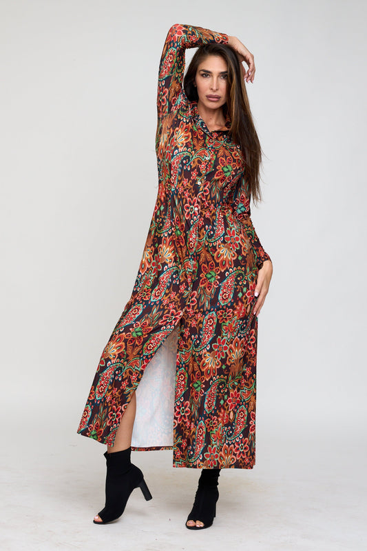 Woman wearing a long, patterned dress on a white background