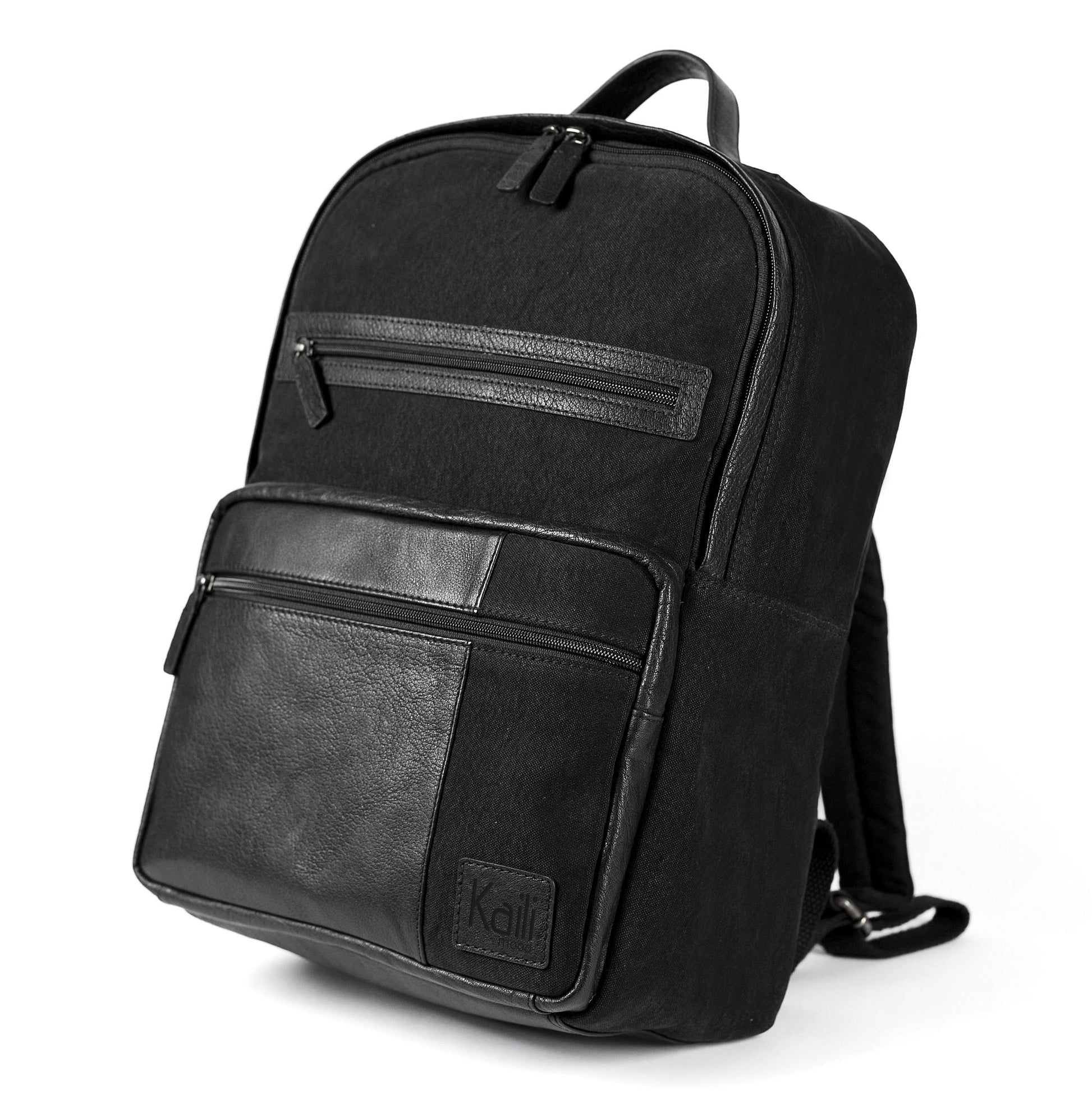 Black backpack with leather accents on a white background