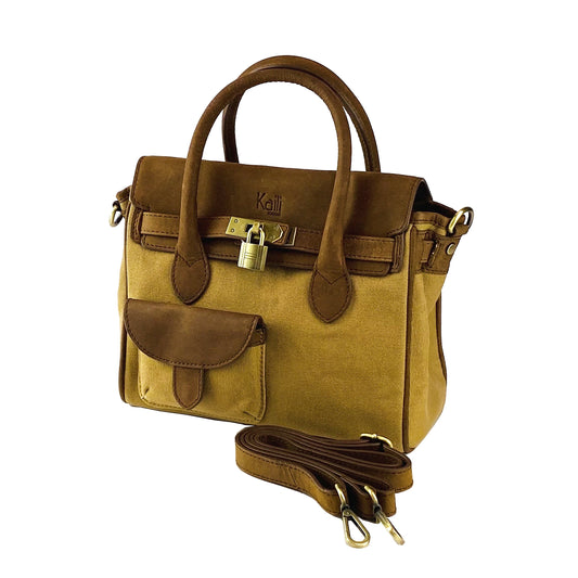 Brown leather handbag with a strap on a white background