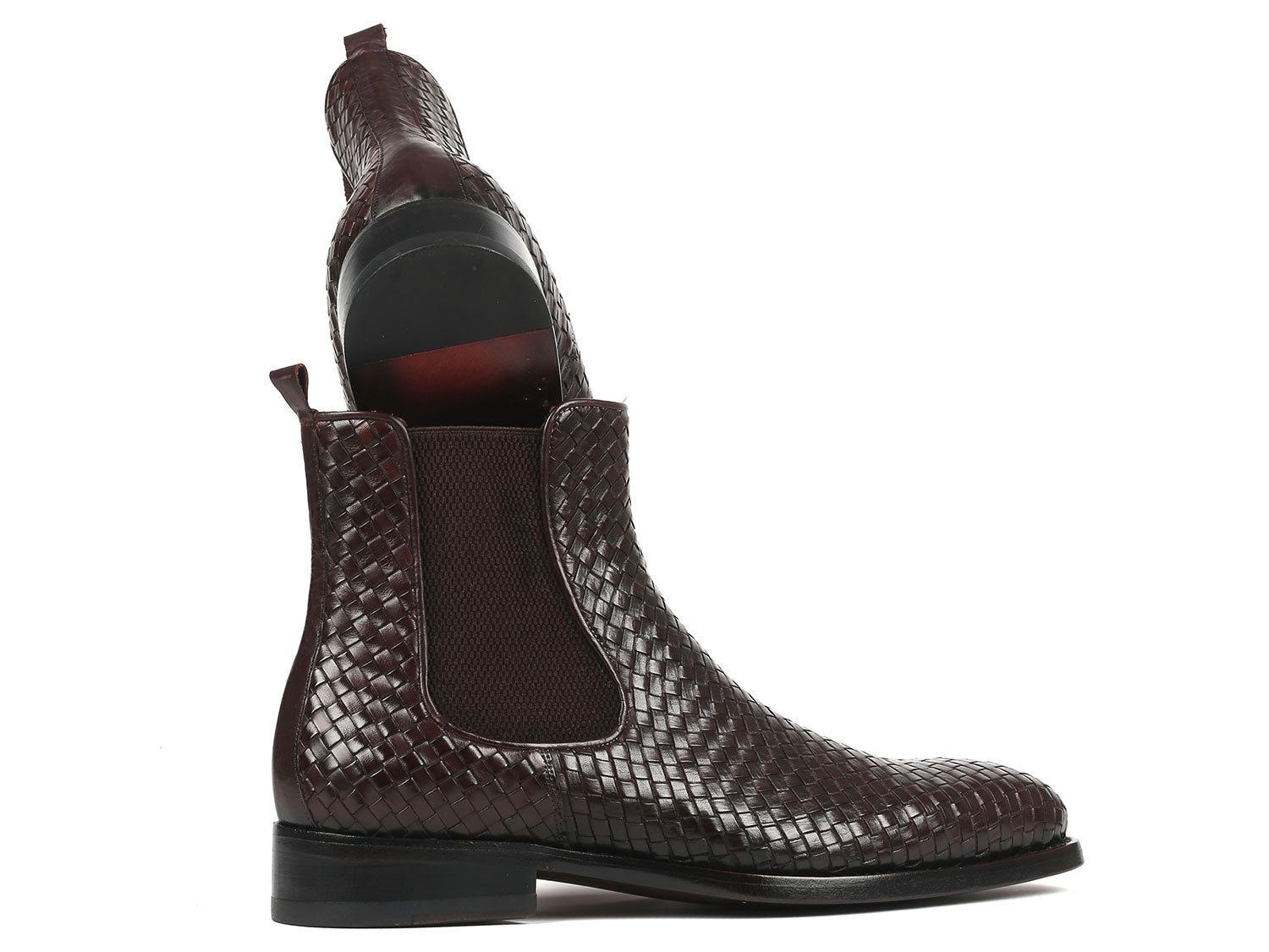 Brown patterned Chelsea boot on a white background