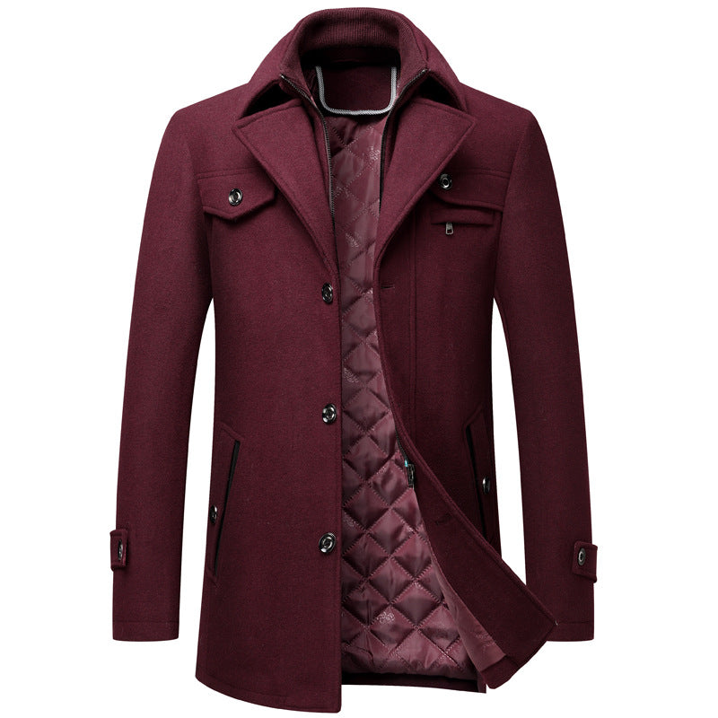 Maroon coat with quilted inner lining on a white background