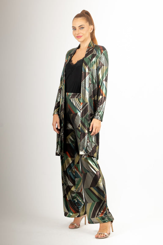 Woman wearing a patterned outfit on a plain background