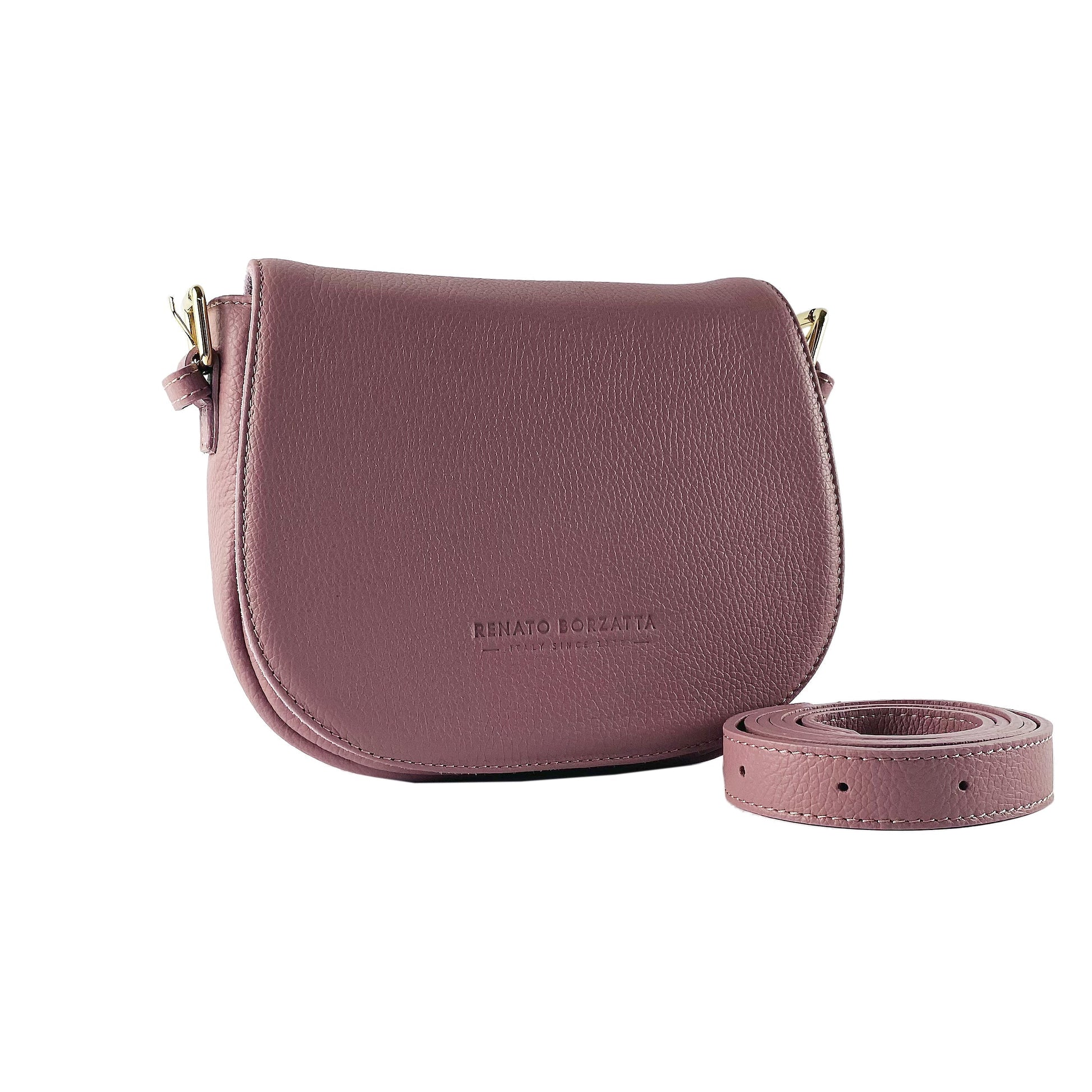 Pink leather saddle bag with matching strap on a white background