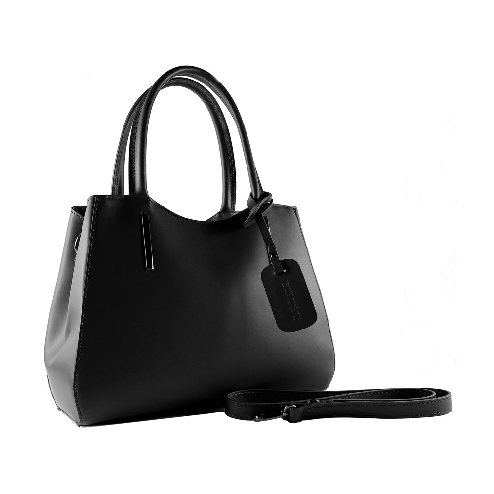 Black handbag with a strap on a white background