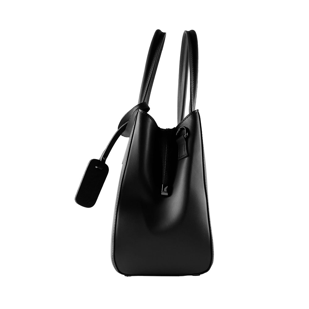 Black handbag with a strap on a white background