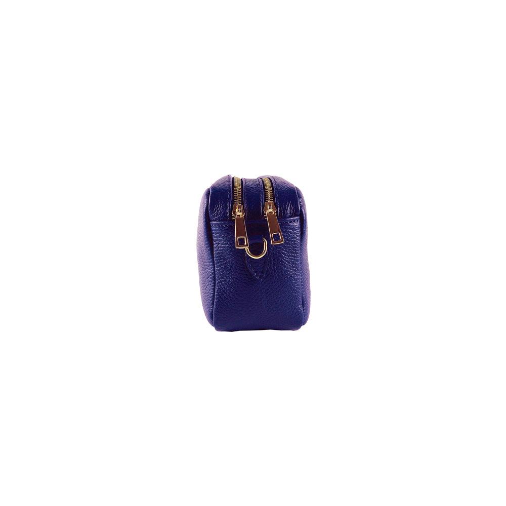 Small purple leather bag with gold zipper on a white background