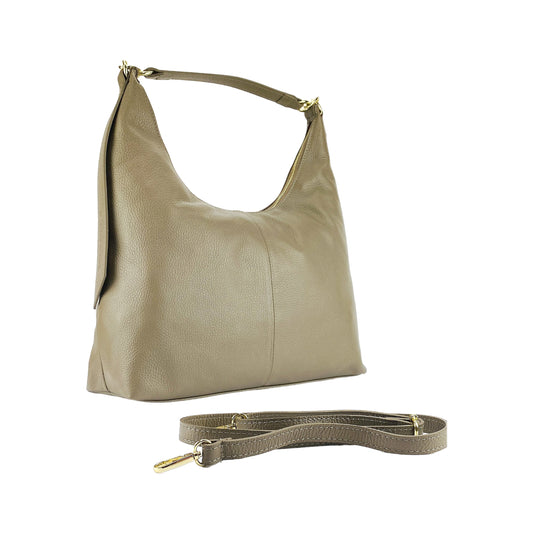 Beige handbag with a matching strap on a white background