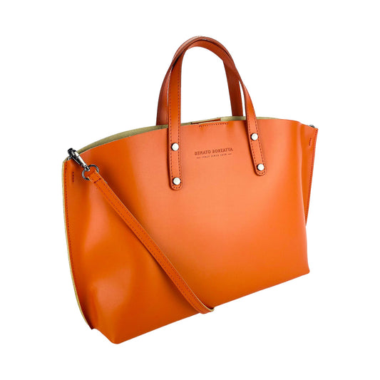 Orange handbag with a shoulder strap on a white background