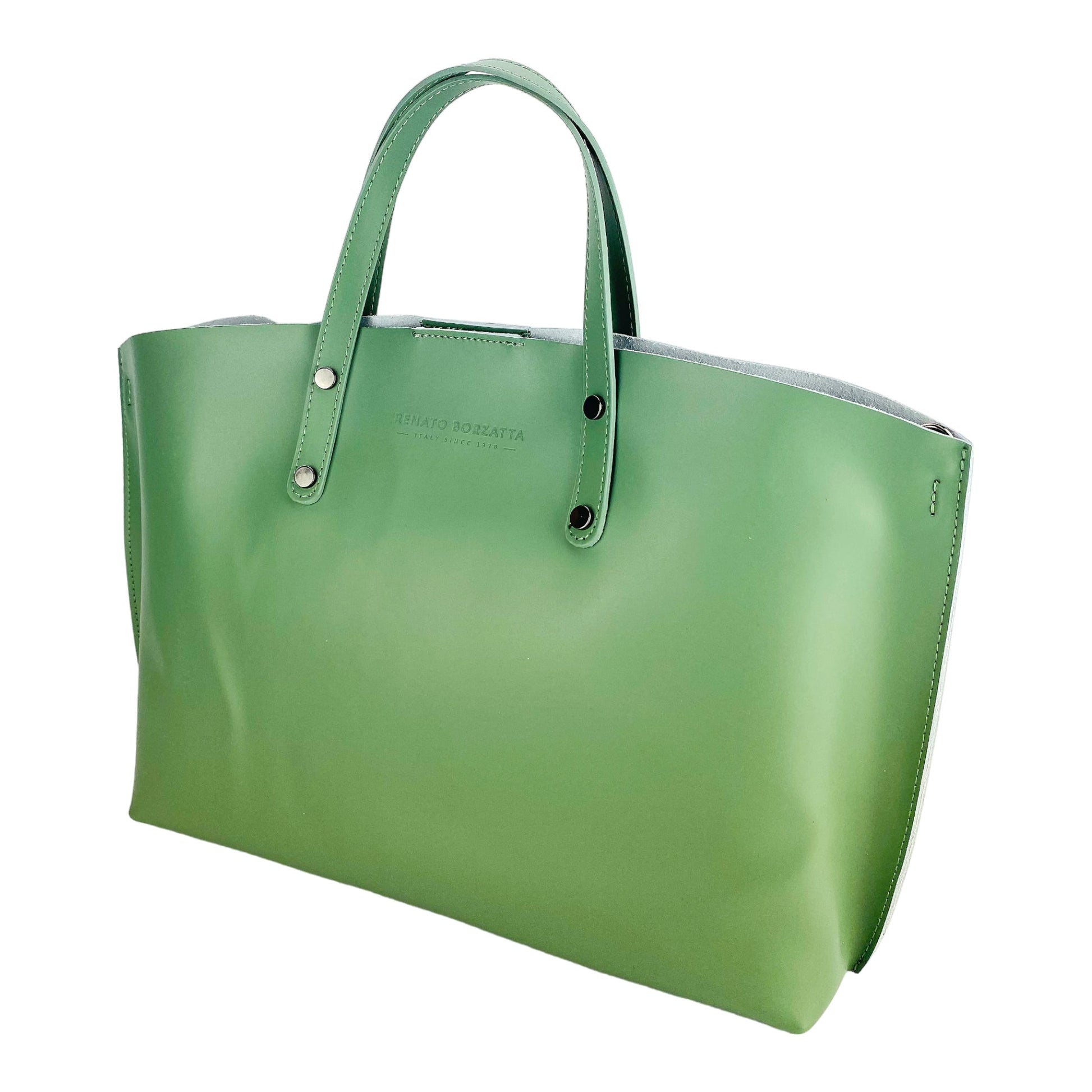 Green handbag with visible brand name on a white background