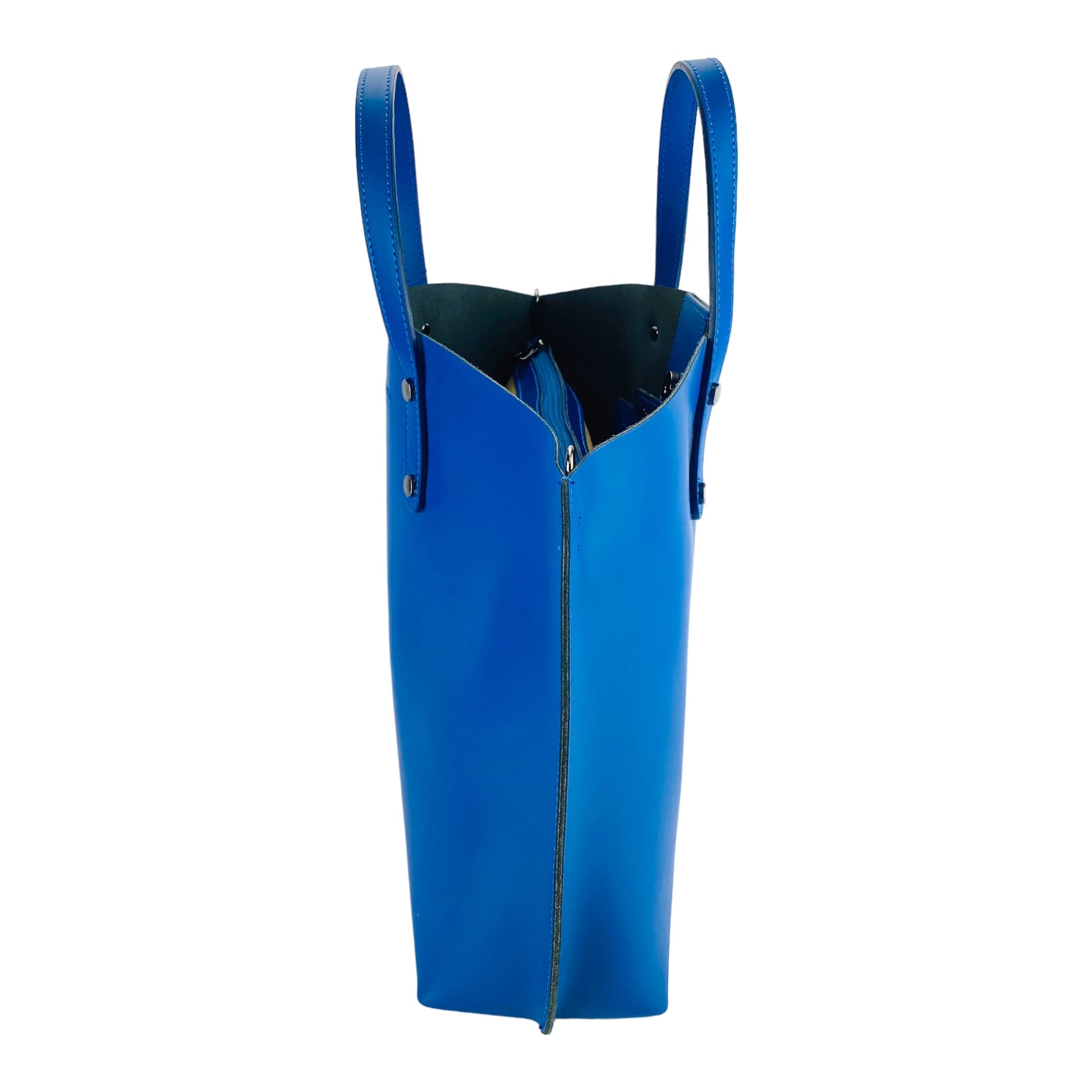 Blue leather bag with handles on a white background