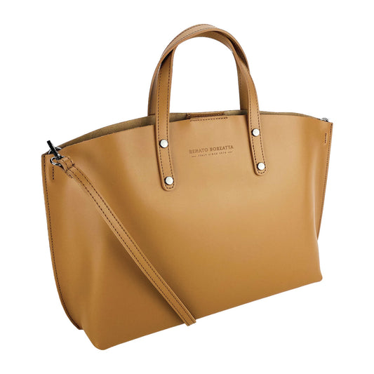 Tan handbag with a shoulder strap on a white background
