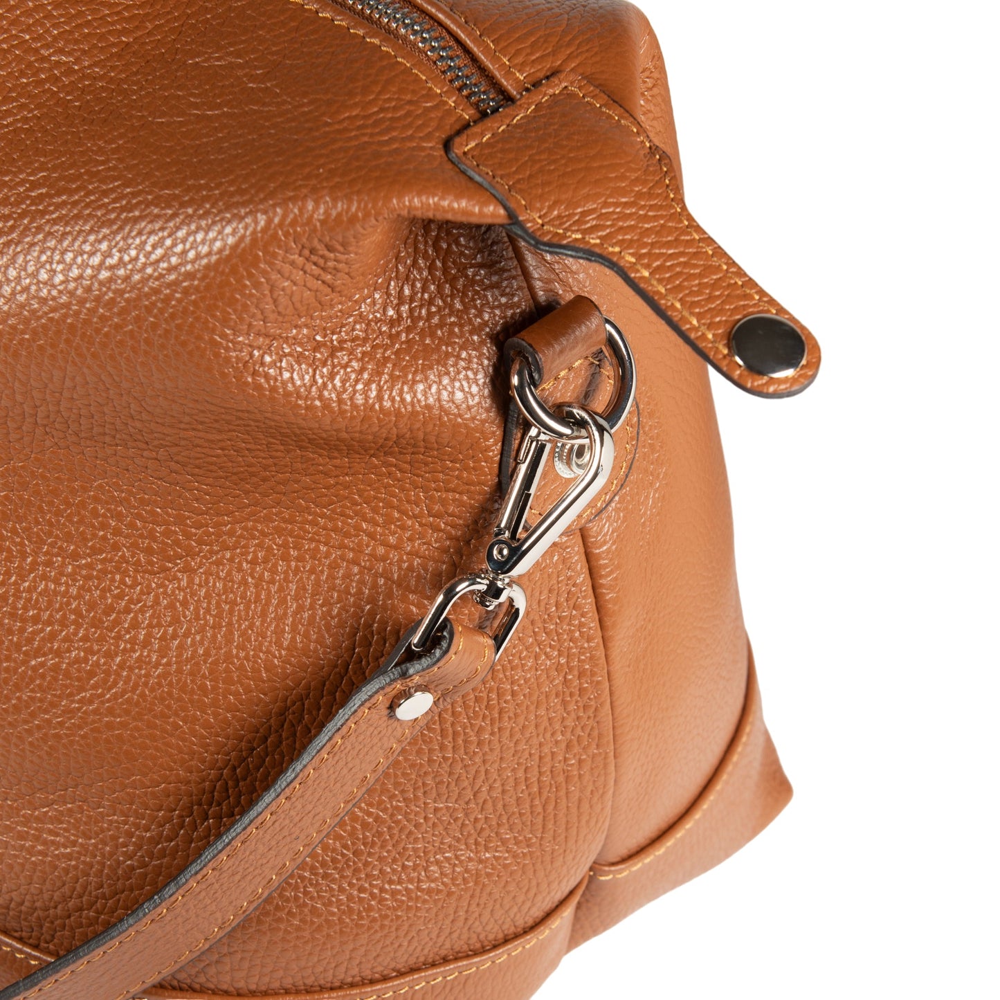 Close-up of a brown leather bag with a zipper on a white background