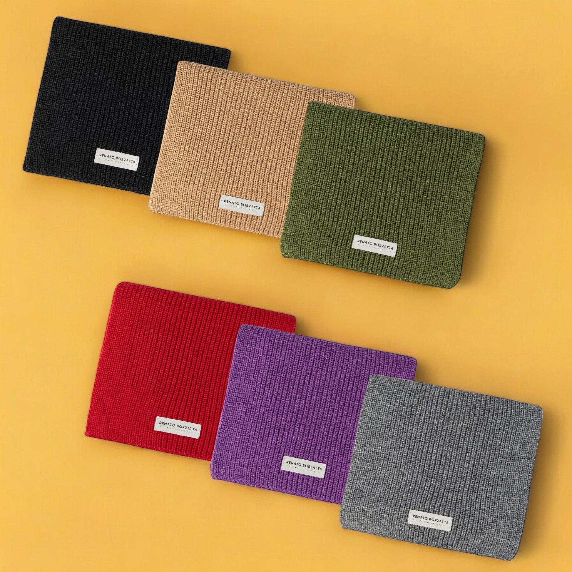 Six fabric samples in black, brown, green, red, purple, and gray on a yellow background.