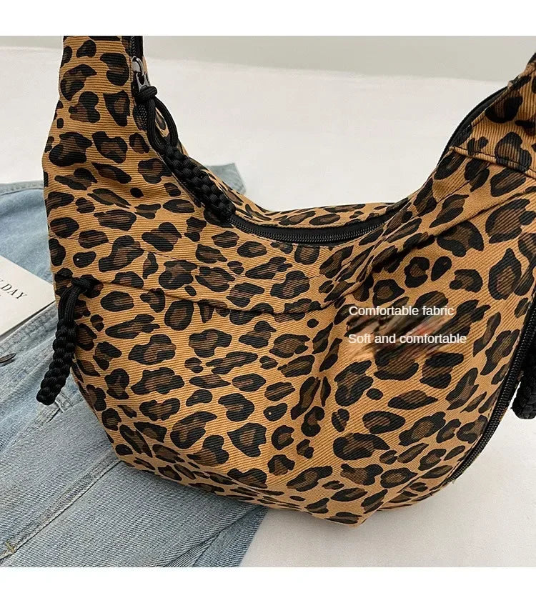 Leopard print bag on a light blue denim background with text 'Comfortable fabric' and 'Soft and comfortable'.