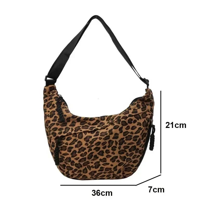 Leopard print shoulder bag with measurements on a white background