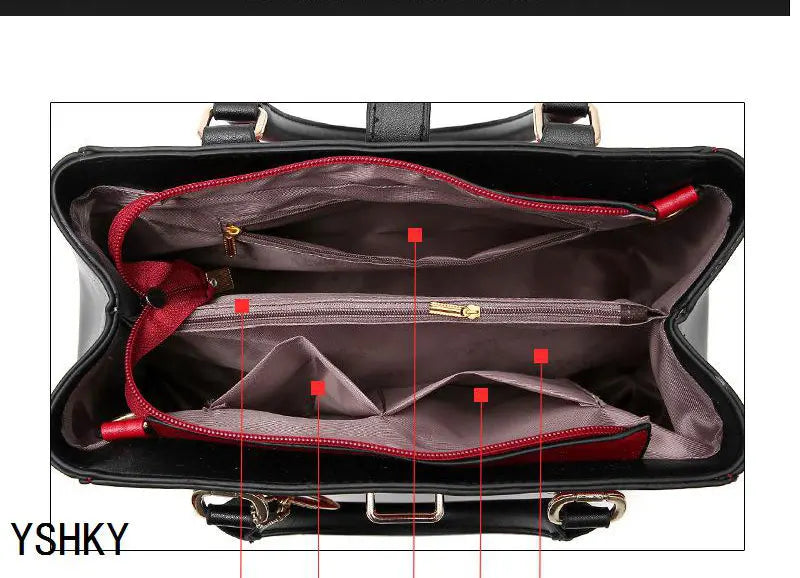 Open briefcase with red interior accents and YSHKY branding.