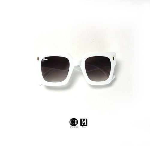 White sunglasses with dark lenses on a white background, featuring the CM logo.