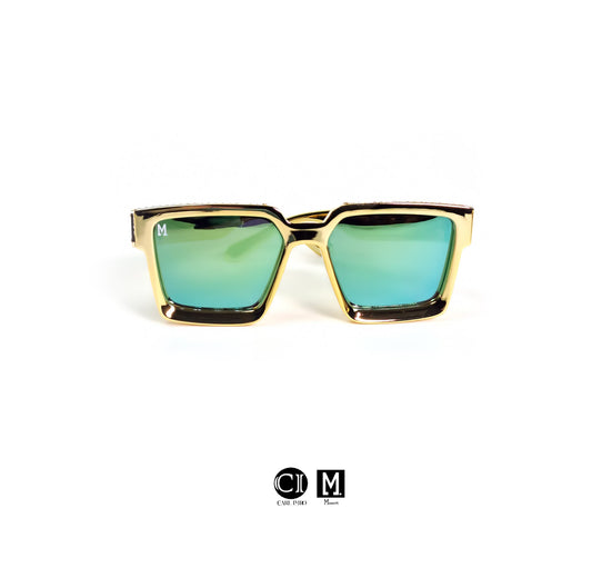 Gold-framed sunglasses with green lenses on a white background
