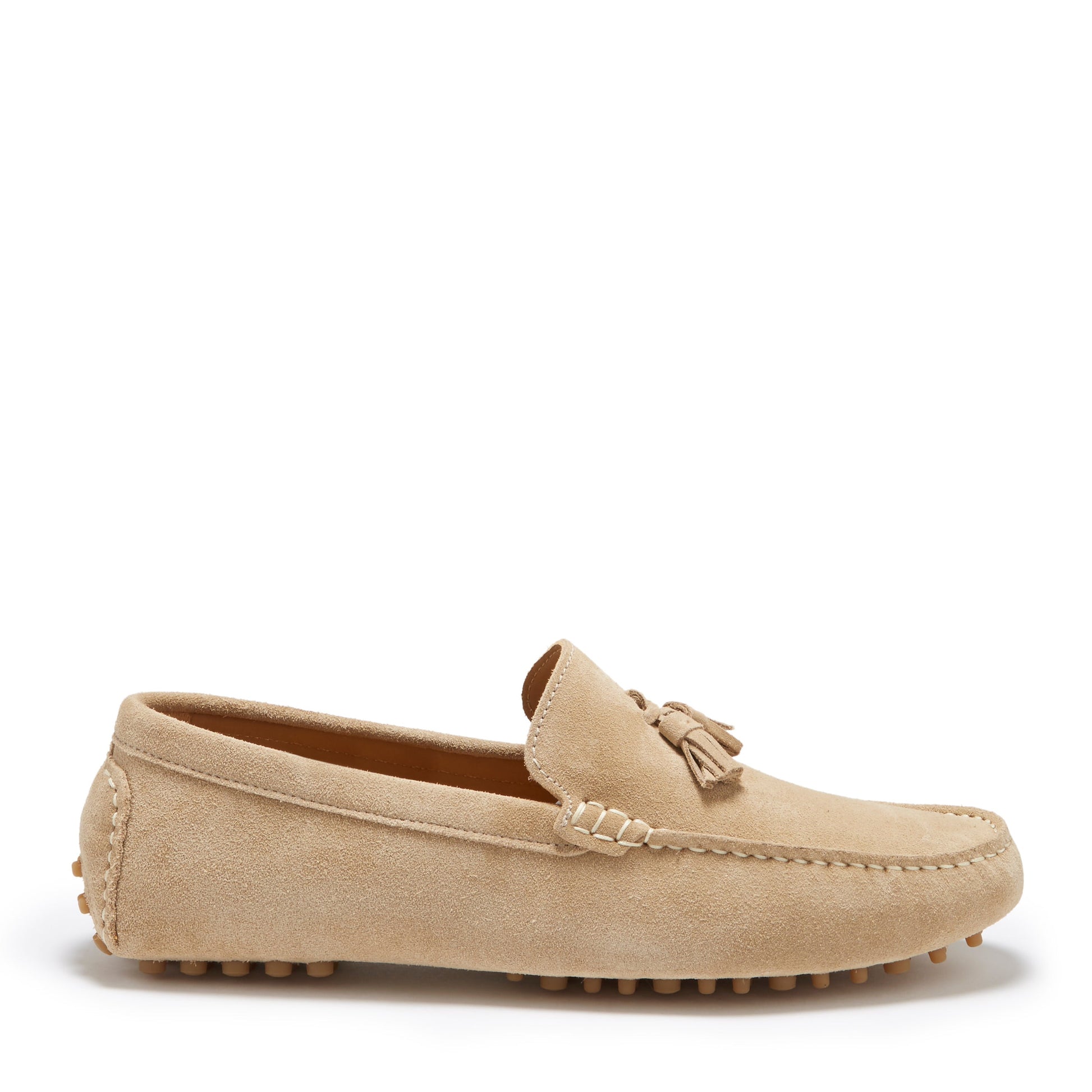 Beige loafer shoe with tassel on a white background