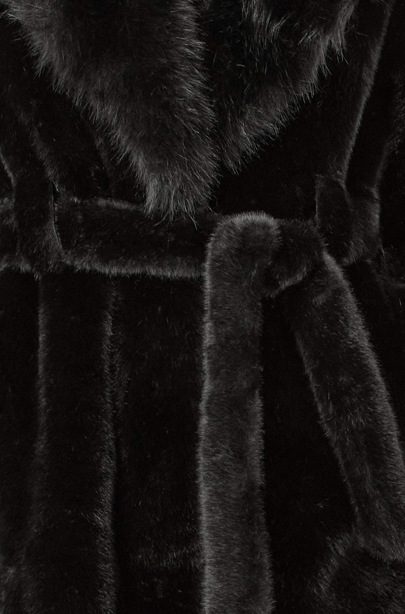Close-up of a black plush robe with fur trim.