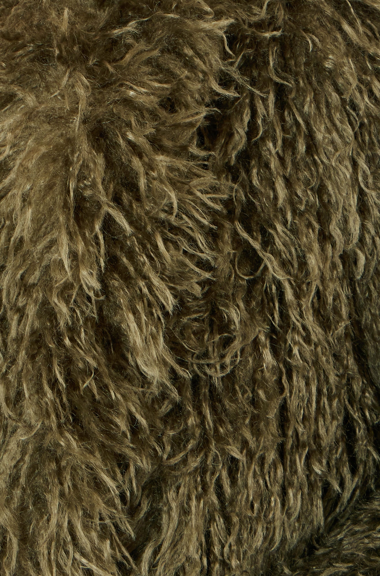 Close-up of brown, shaggy fabric texture