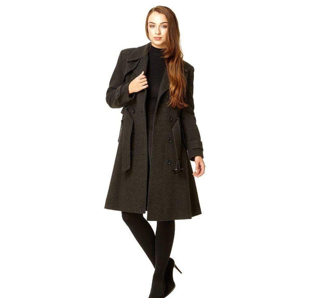 Woman wearing a dark gray coat on a white background with 'De La Creme Fashions' branding.