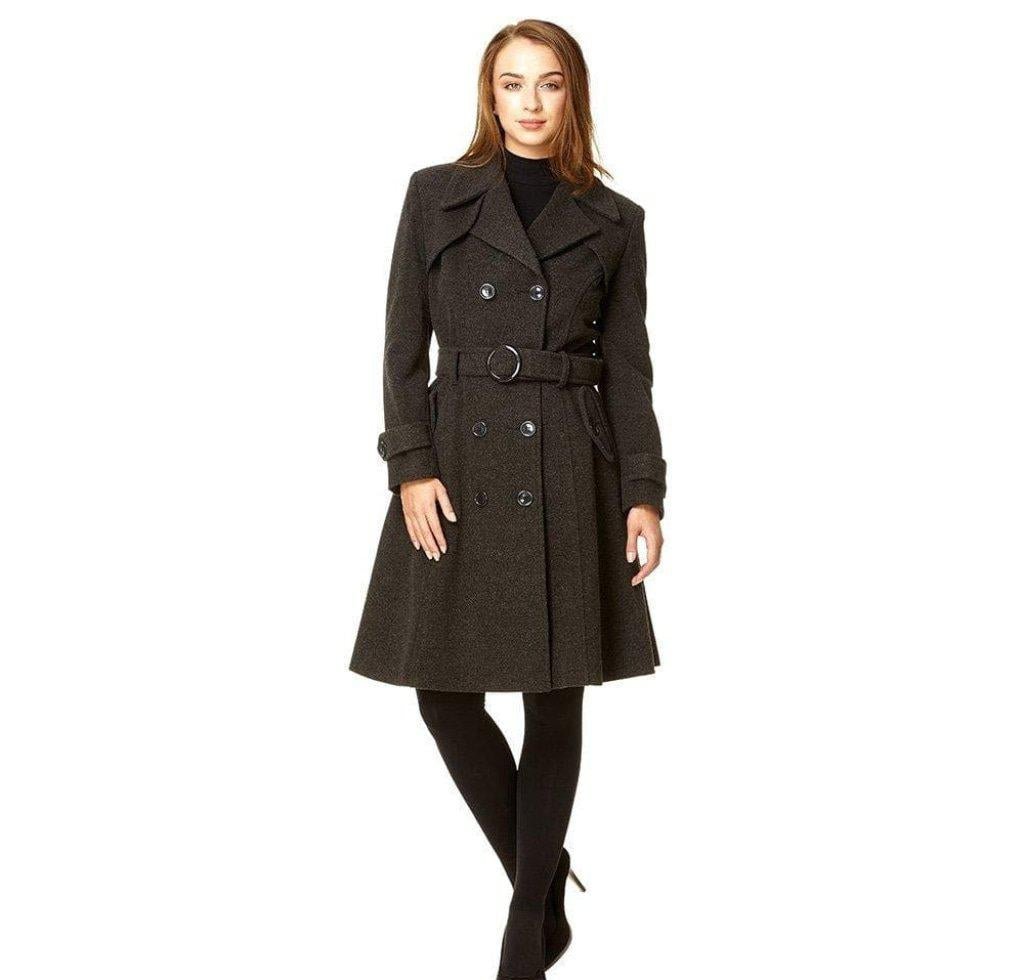 Woman wearing a dark gray trench coat on a white background