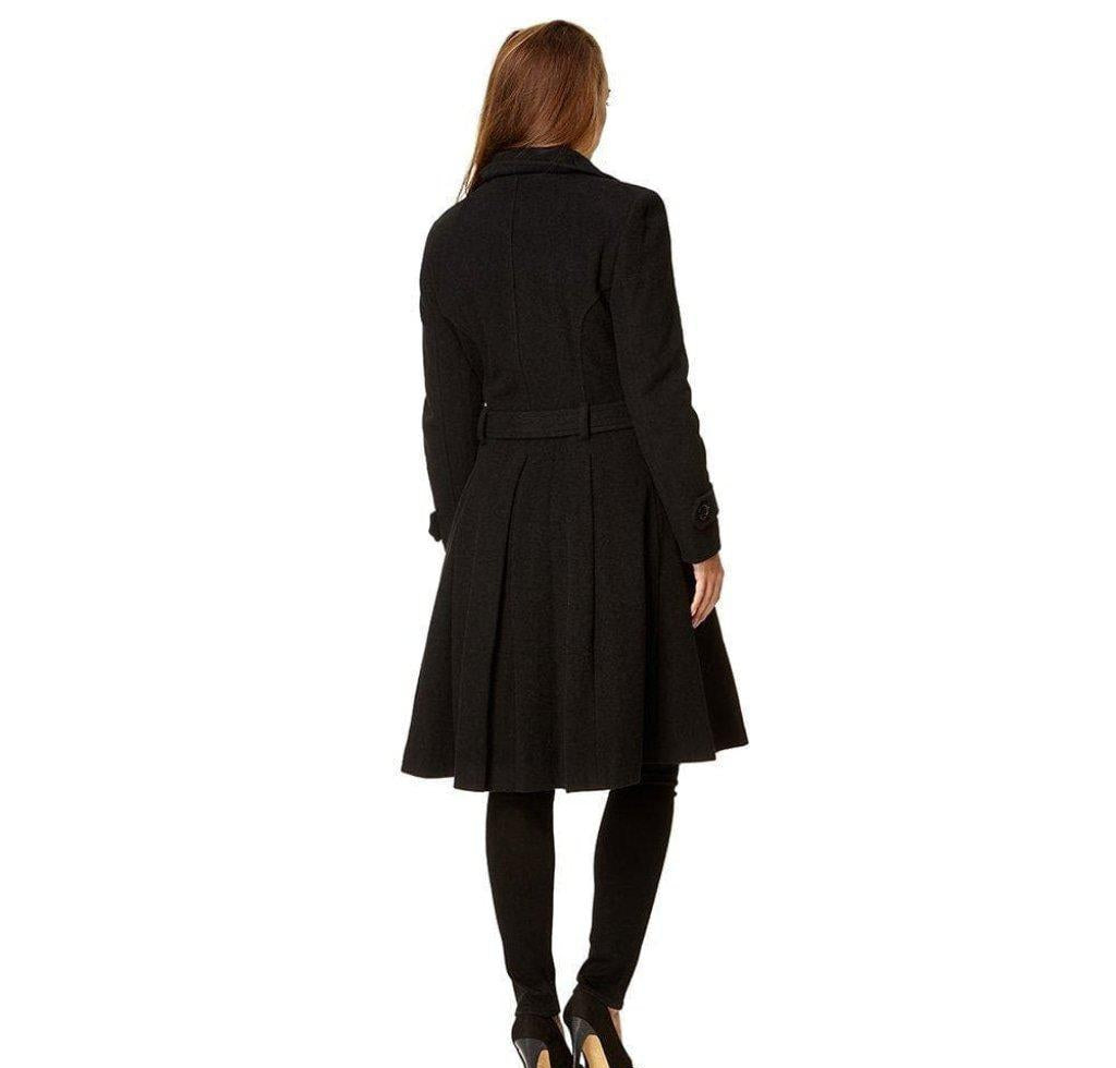 Black coat worn by a model on a white background