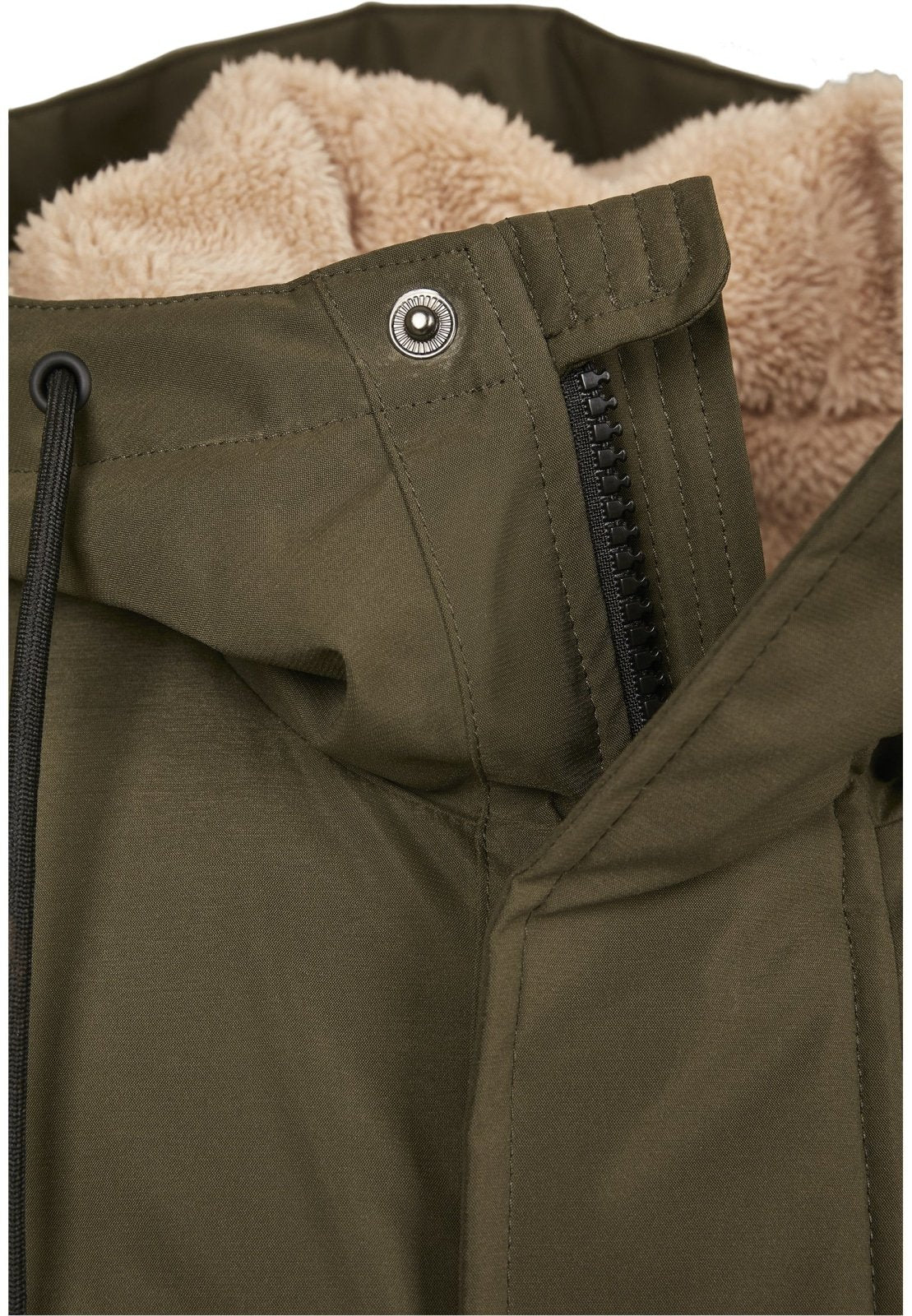 Close-up of a green jacket with beige fleece lining and a button.