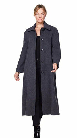 Woman wearing a long dark coat