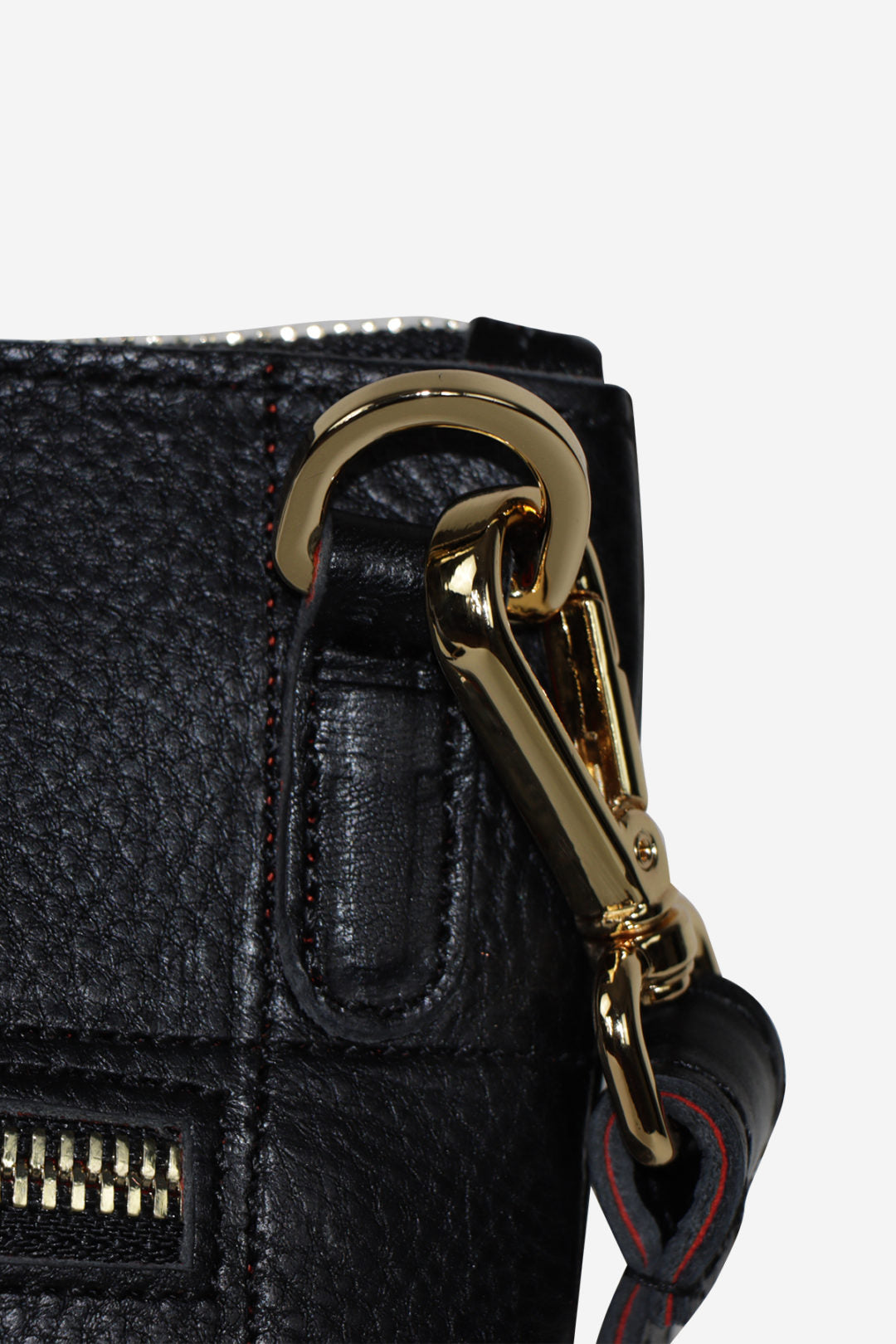 Black textured bag with a gold carabiner on a white background