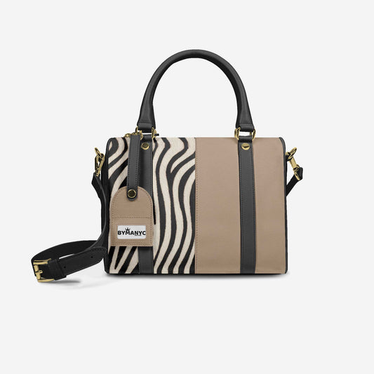 Handbag with zebra pattern and beige section on a white background