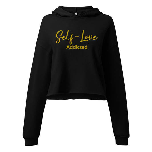 Black hoodie with 'Self-Love Addicted' text in yellow on a white background