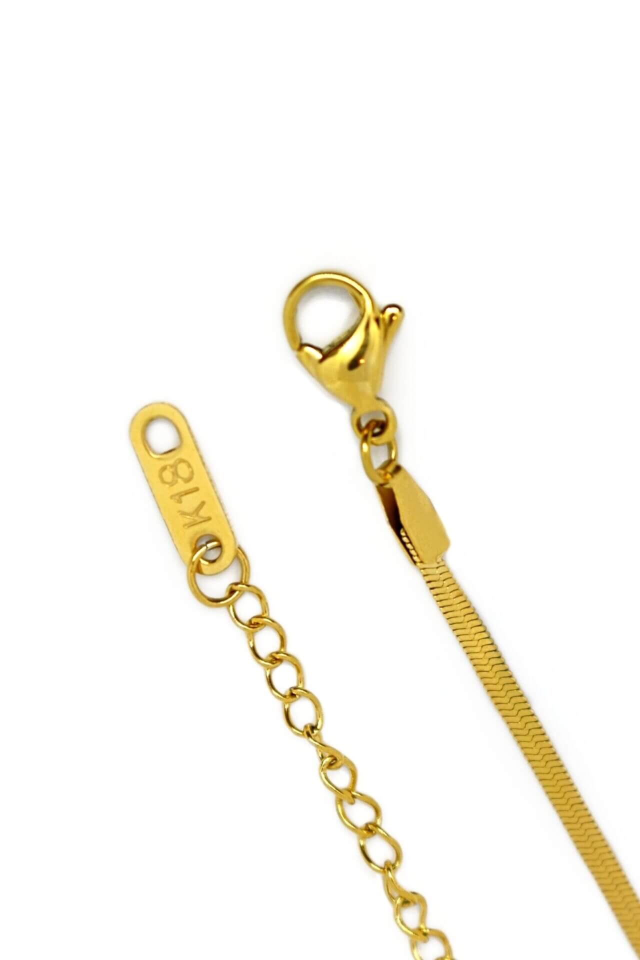 Gold chain with clasp and lobster lock on a white background