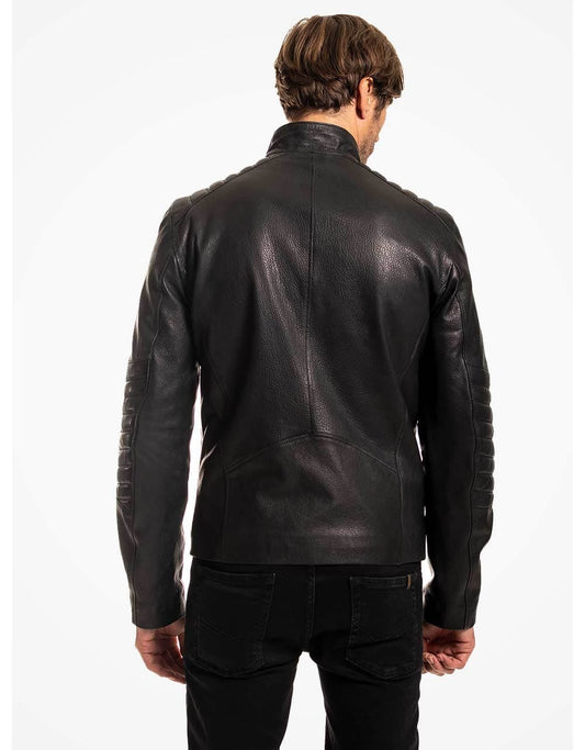 Man wearing a black leather jacket on a white background