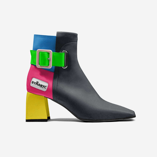 Colorful ankle boot with a green buckle and ByManyc label on a white background