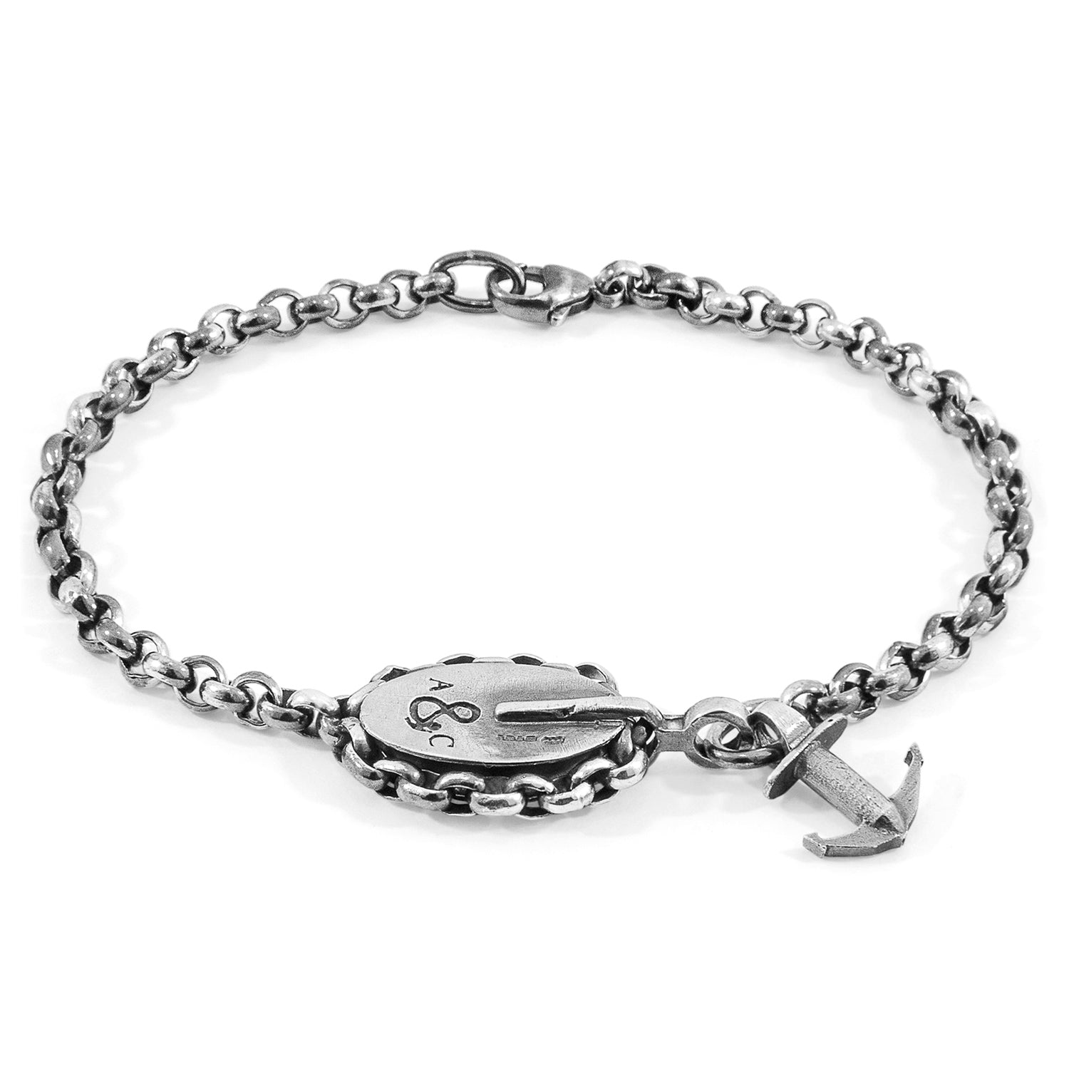Silver bracelet with anchor charm on a white background