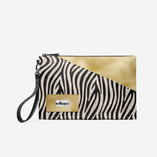 Zebra print clutch with gold accents and 'BYMANYC' logo on a white background