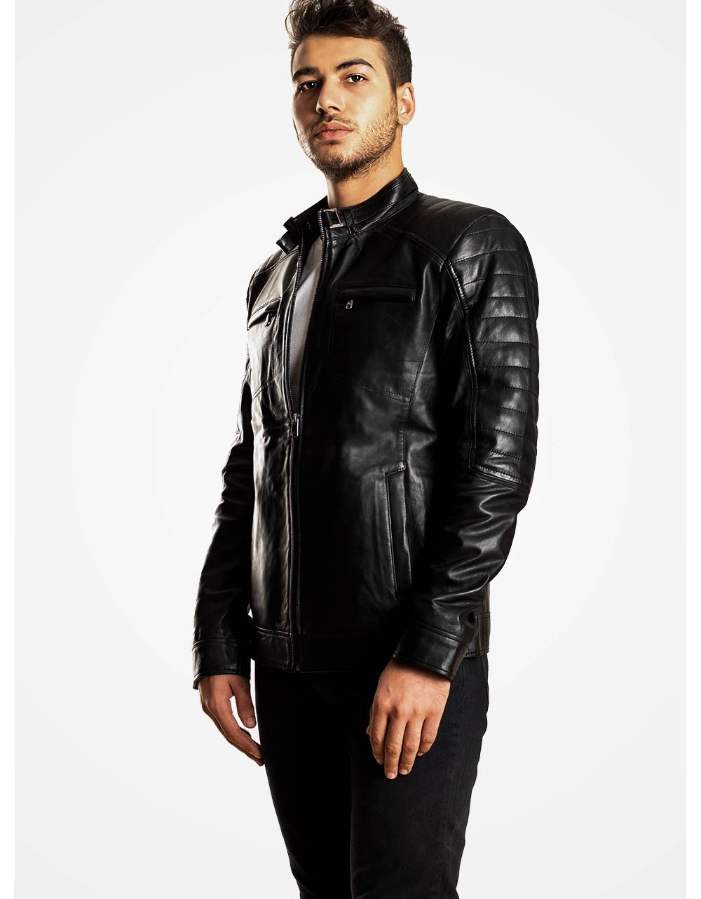 Man wearing a black leather jacket on a white background