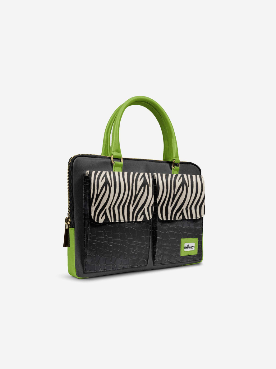 Handbag with zebra pattern and green handles on a white background