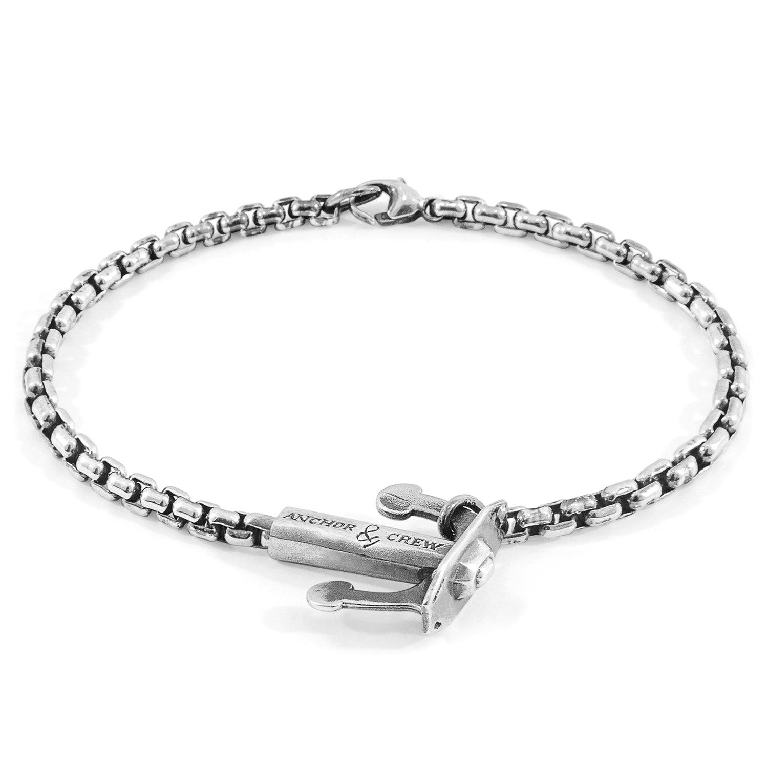 Silver chain bracelet with clasp on a white background