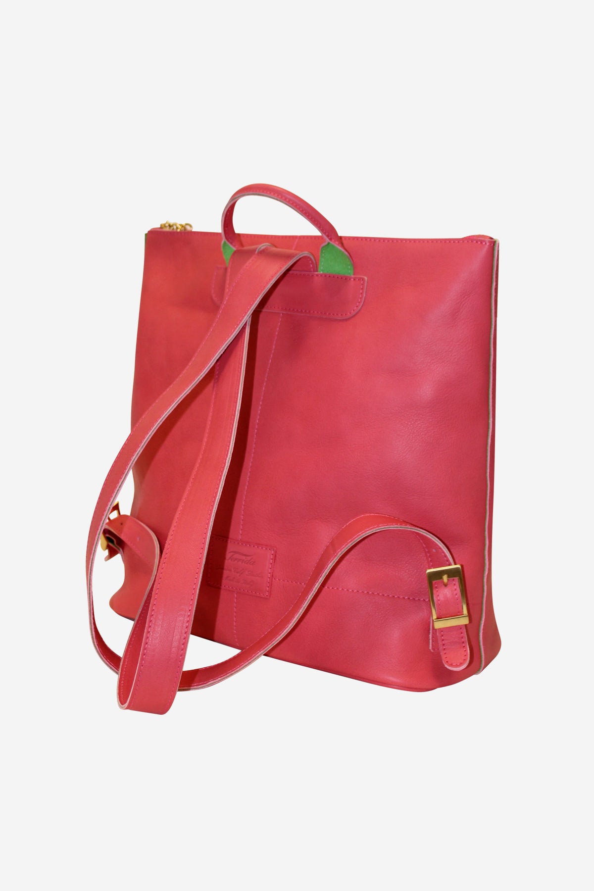 Red leather backpack with a gold buckle on a white background