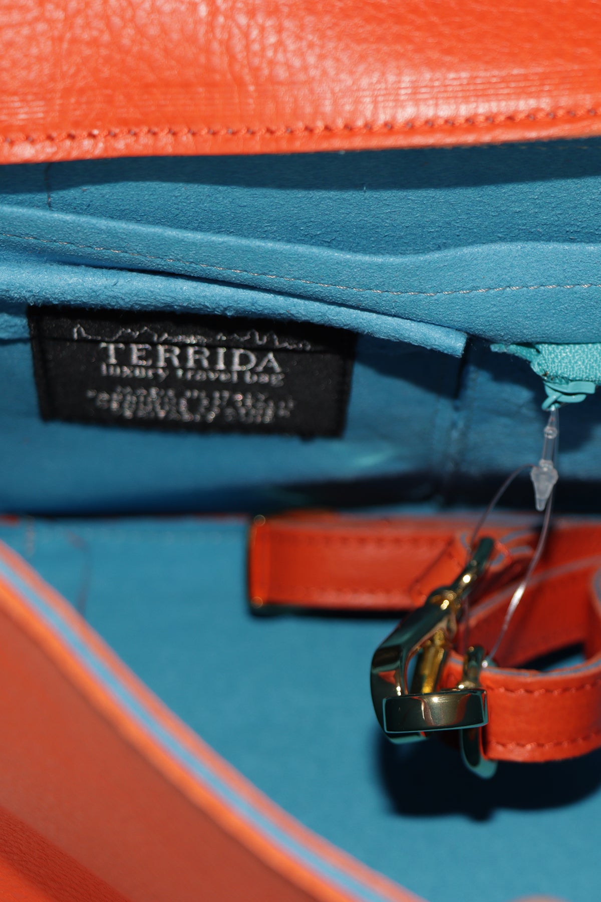 Close-up of a multicolored bag with a visible brand label.