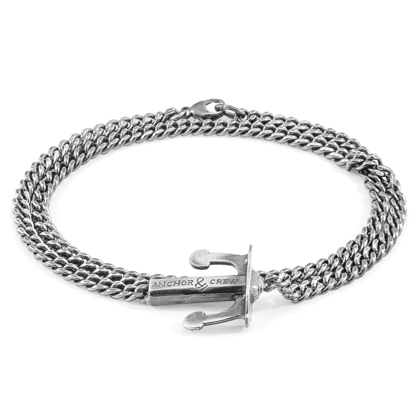 Silver chain bracelet with anchor clasp on a white background