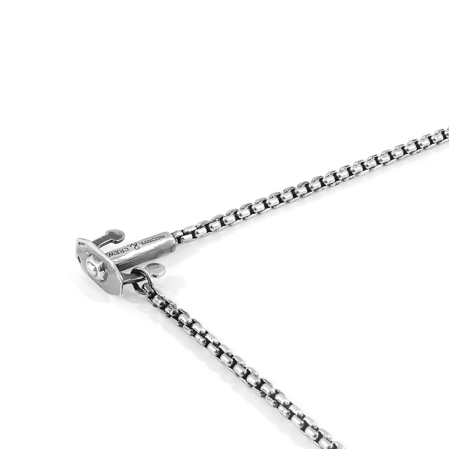 Silver chain necklace with clasp on a white background