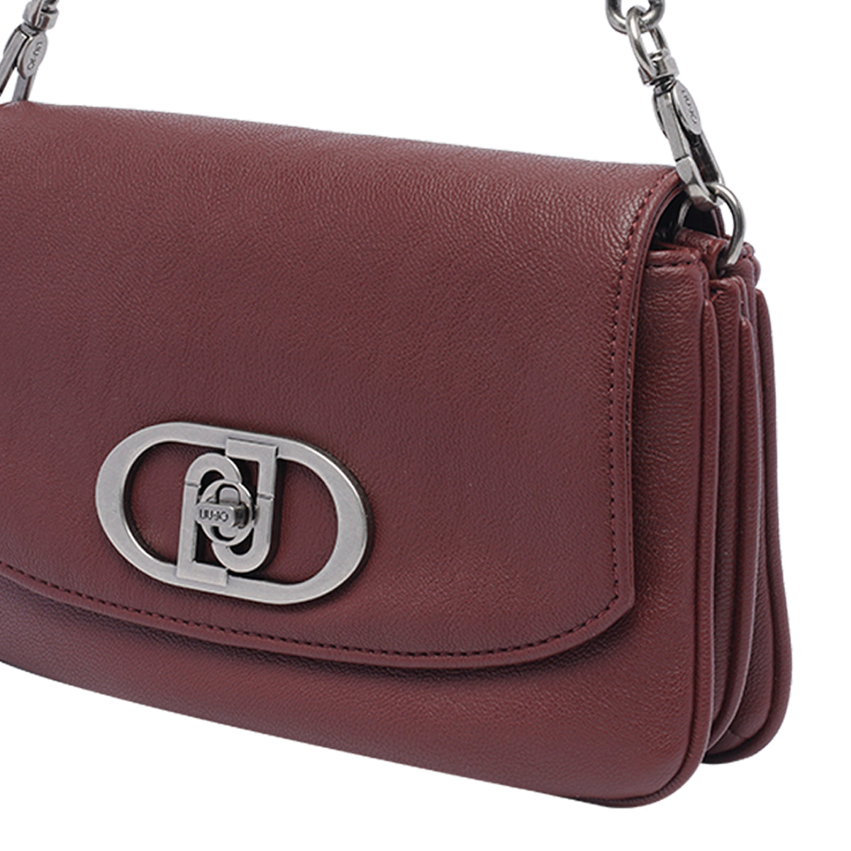 Maroon handbag with a silver logo on a white background