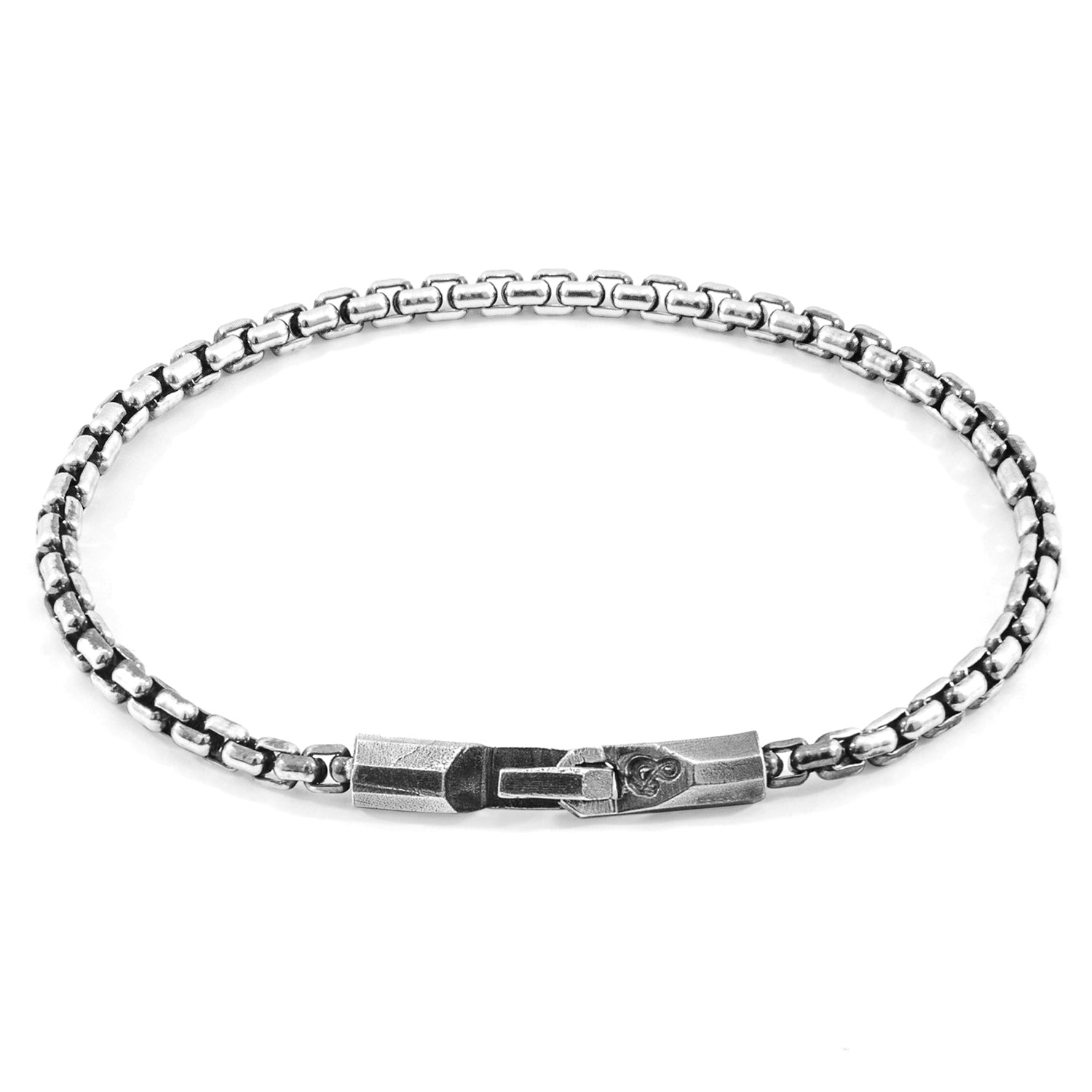 Silver chain bracelet on a white background