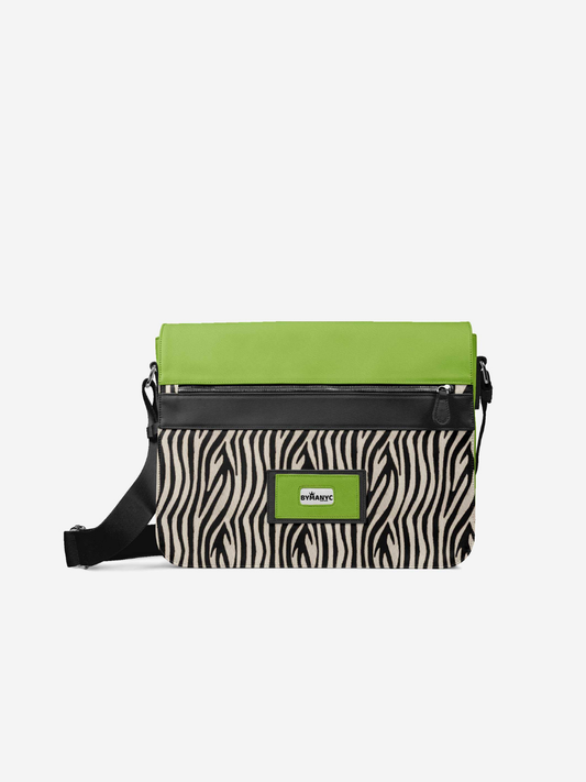 Crossbody bag with zebra pattern and green accents on a white background