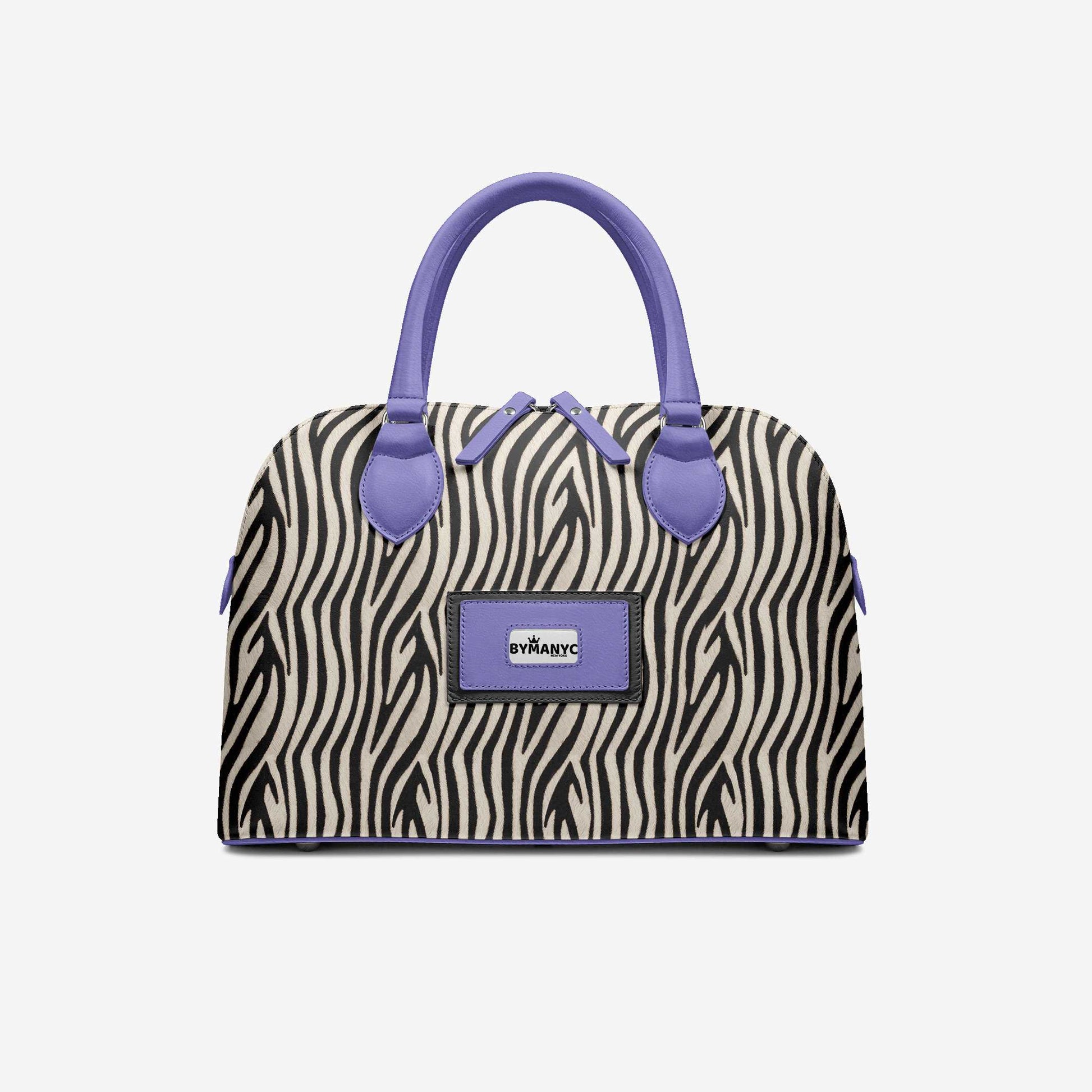 Handbag with zebra pattern and purple handles on a light gray background